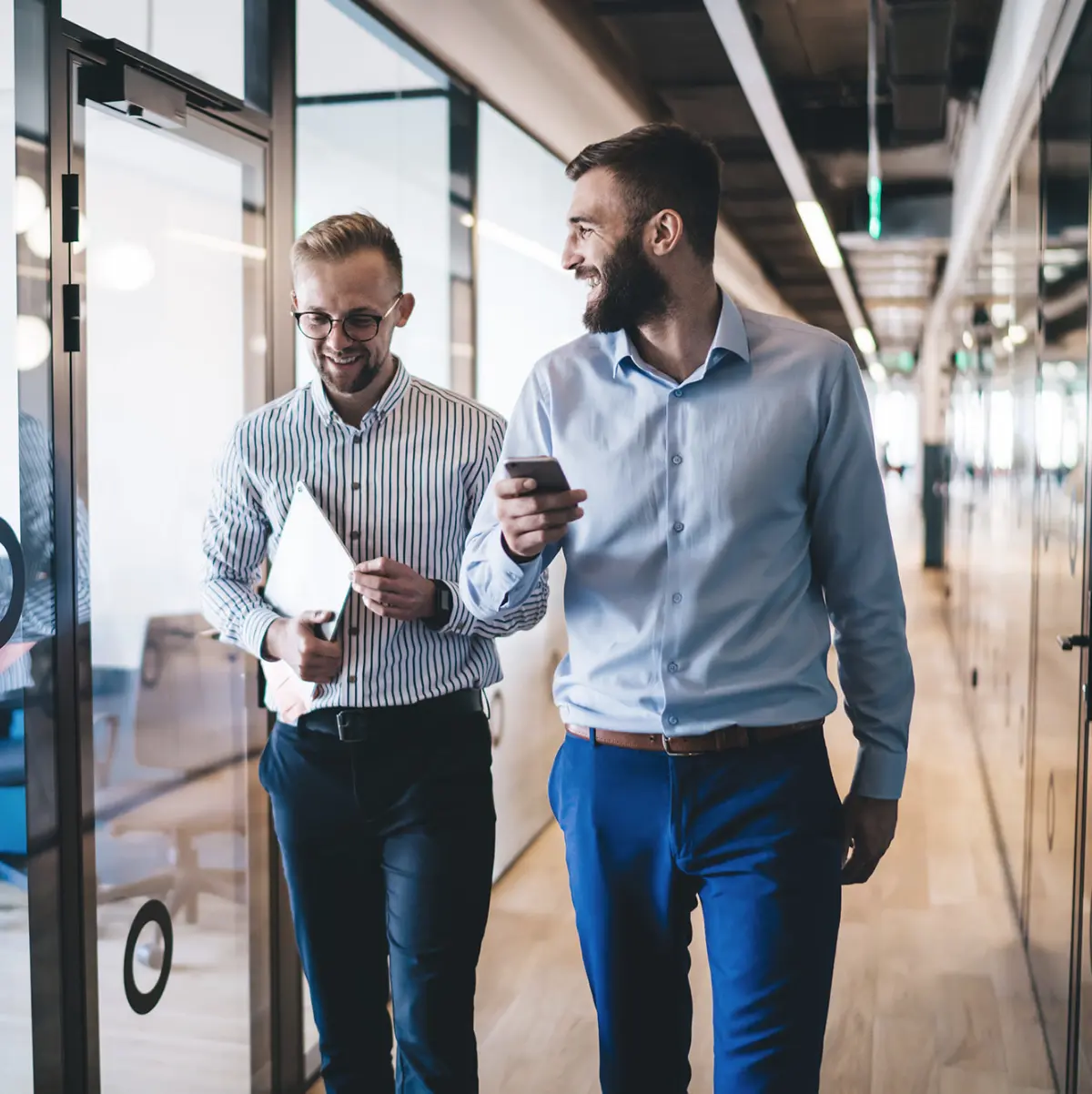 image of two people walking