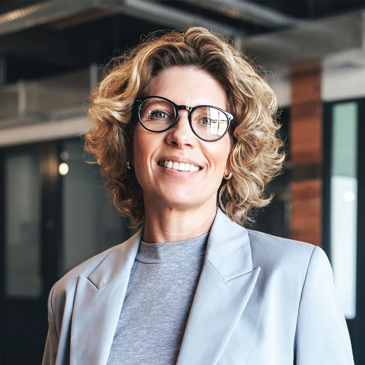 image of woman smiling at the camera