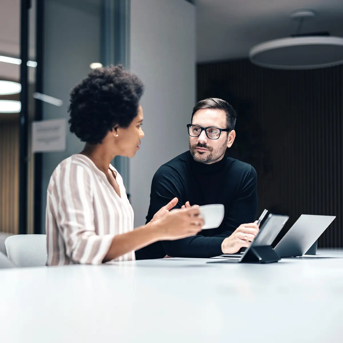 image of two people in conversation