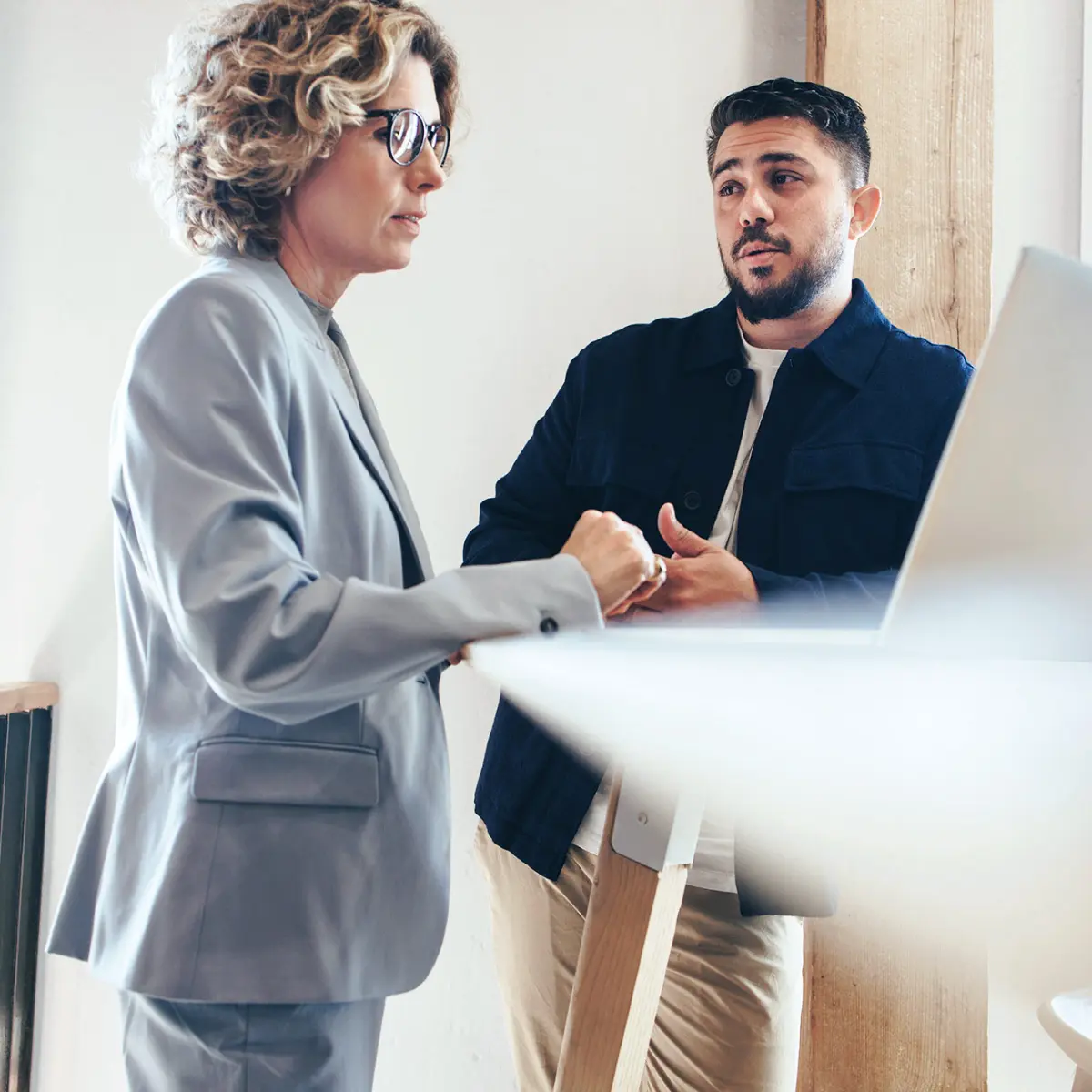 image of two people in coversation